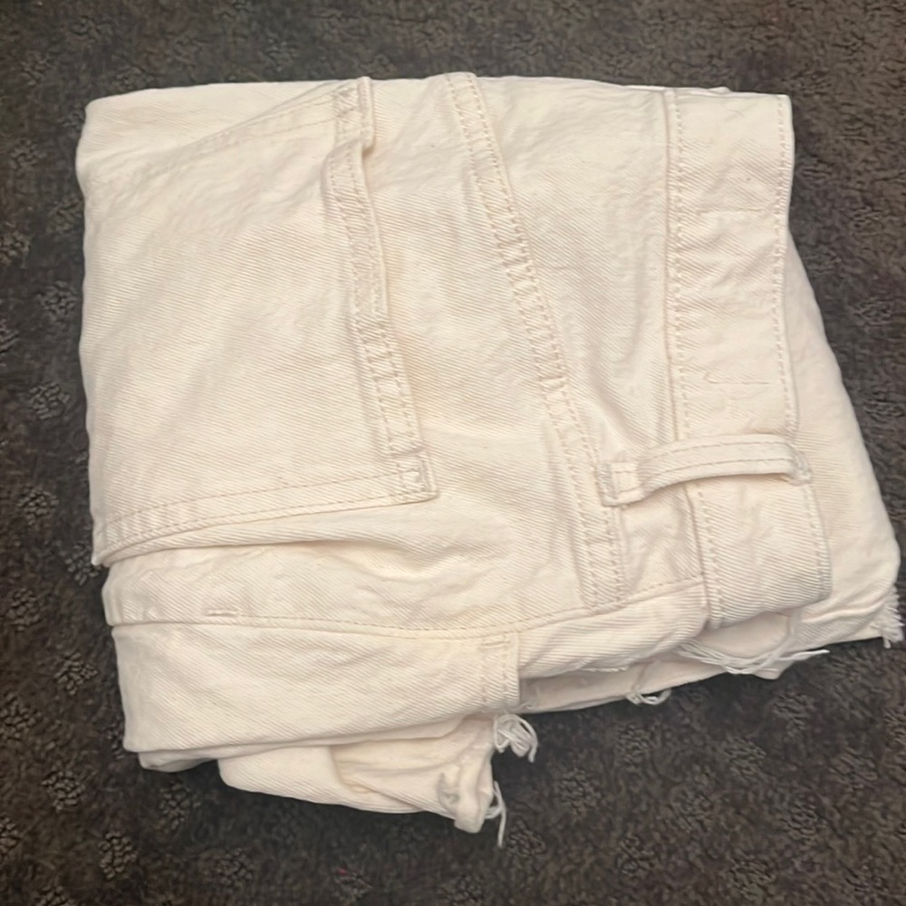 Cream Colored Ripped Jeans